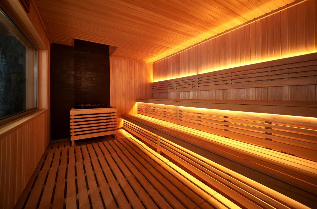 Premier Hotel Odessa Esterno foto A modern Finnish sauna